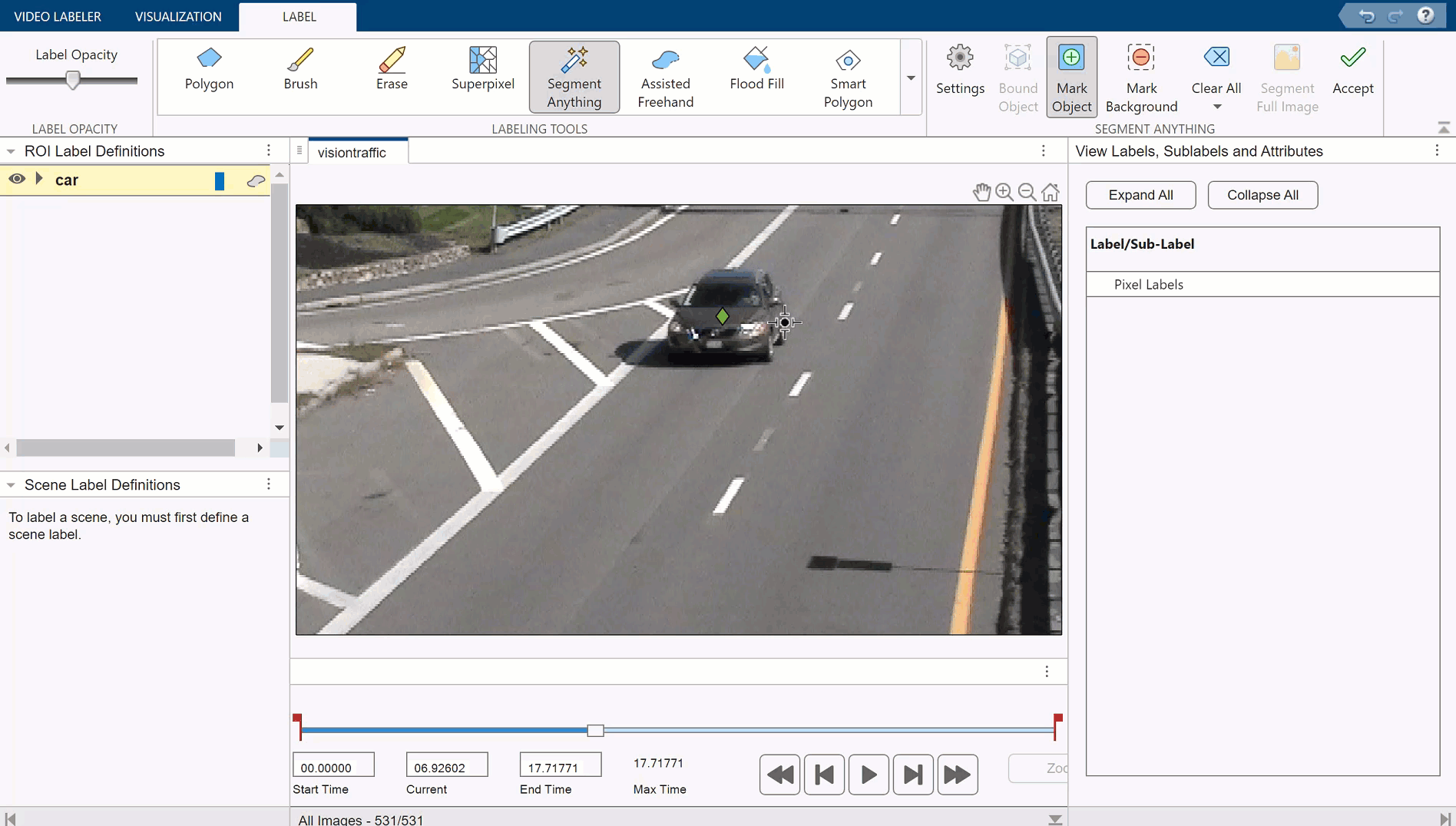 In a Video Labeler app window, the pointer selects a car in an image frame of a video, segmenting the car with one click.